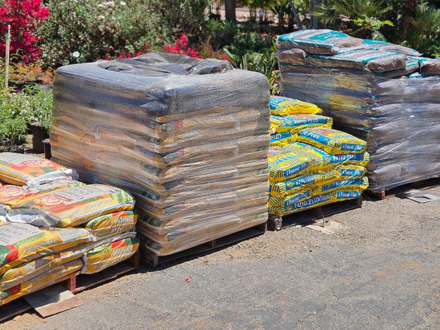 Pallets of bagged mulch and soil
